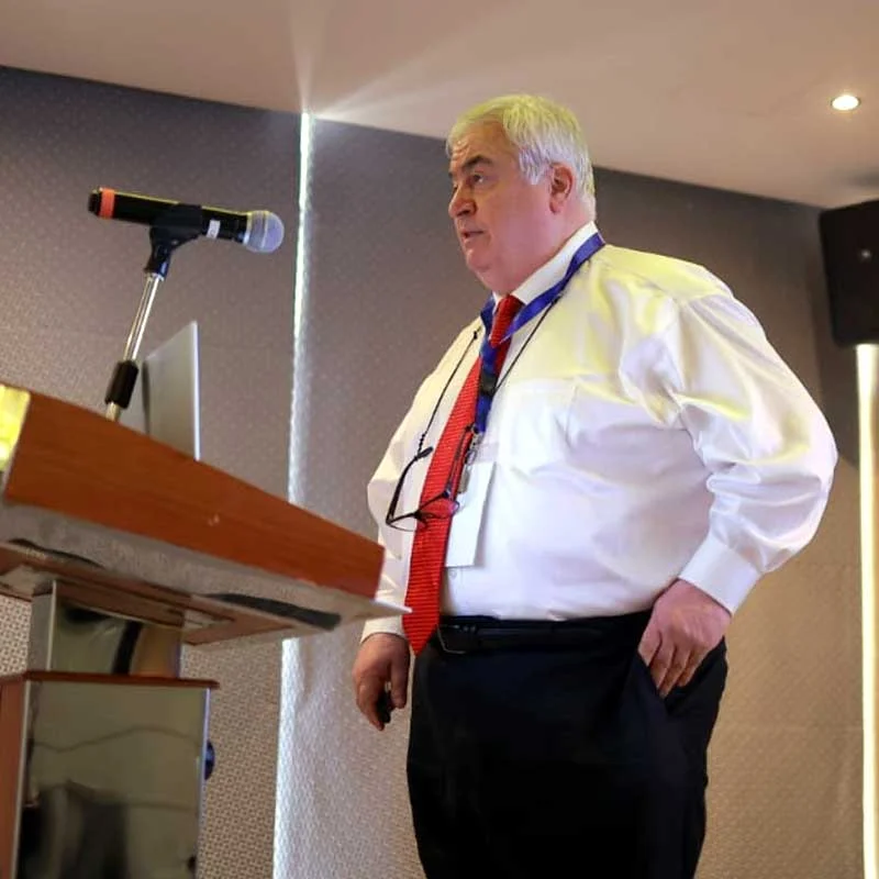 Dr. Dimitry Tvildiani, MD, PhD